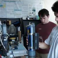 Ian and Nate calibrating sensors on a lab bench